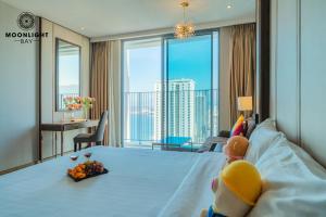 a hotel room with a bed with a view at Nha Trang Superview Holidays in Nha Trang