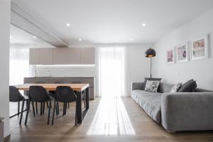Posezení v ubytování La Giostra Deluxe Apartments + 41 fotografií