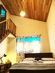 Postel nebo postele na pokoji v ubytování Onchillawa garden accommodation