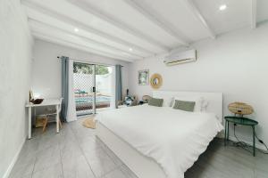 Postel nebo postele na pokoji v ubytování Villa Mali