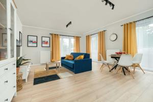 Posezení v ubytování Stylowy Apartament z Parkingiem Łódź by Noclegi Renters + 43 fotografií
