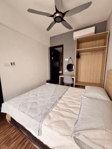 Postel nebo postele na pokoji v ubytování K-Avenue by FFix-Stay