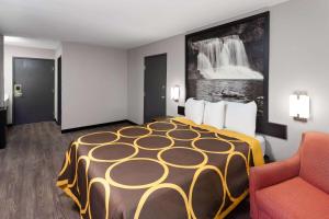 Voodi või voodid majutusasutuse Super 8 by Wyndham Olney toas