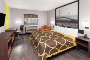 Voodi või voodid majutusasutuse Super 8 by Wyndham Olney toas