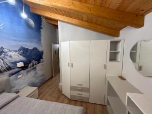 Postel nebo postele na pokoji v ubytování B&B Valtilí