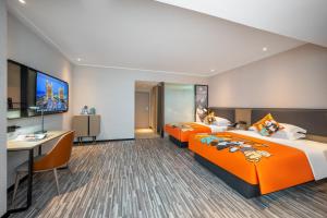 Foto dalla galleria di Echarm Hotel Changsha High Speed Rail South Station Wujiang Tianjie Branch a Changsha
