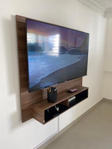 TV a/nebo společenská místnost v ubytování LIVING CARTAGENA Apto de lujo