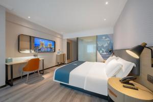 Foto dalla galleria di Echarm Hotel Changsha High Speed Rail South Station Wujiang Tianjie Branch a Changsha