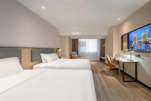 Foto dalla galleria di Echarm Hotel Changsha High Speed Rail South Station Wujiang Tianjie Branch a Changsha