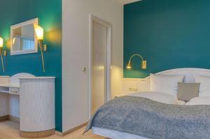 Voodi või voodid majutusasutuse Centro Hotel Sautter Stuttgart City, Trademark Collection by Wyndham toas