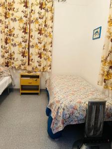 Postel nebo postele na pokoji v ubytování Casa EMMID