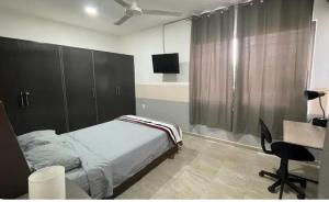 Postel nebo postele na pokoji v ubytování Departamento Orellana 11