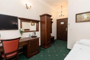 TV a/nebo společenská místnost v ubytování Royal Hotel Modlin