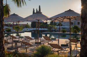 Bazén v ubytování Molum Hotel & Residences nebo v jeho okolí