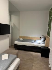 Postel nebo postele na pokoji v ubytování Hildesheim Pepperworth