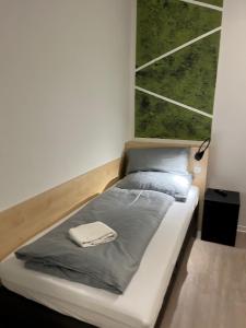 Postel nebo postele na pokoji v ubytování Hildesheim Pepperworth