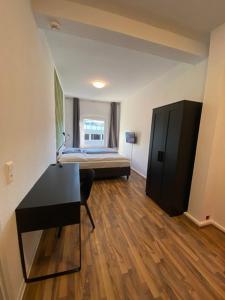 Postel nebo postele na pokoji v ubytování Hildesheim Pepperworth