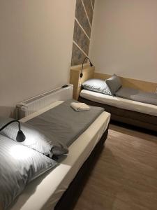 Postel nebo postele na pokoji v ubytování Hildesheim Pepperworth