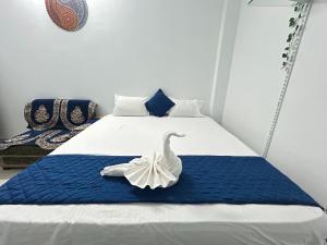 Katil atau katil-katil dalam bilik di Asha Natural Home - I