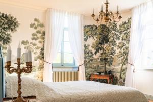 Postel nebo postele na pokoji v ubytování Le Prieuré de Beaupré - Proche Besançon