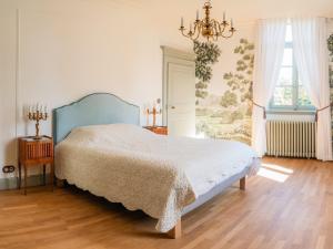 Postel nebo postele na pokoji v ubytování Le Prieuré de Beaupré - Proche Besançon