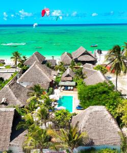 an aerial view of a resort with the ocean at Ananda Beach Hotel in Paje