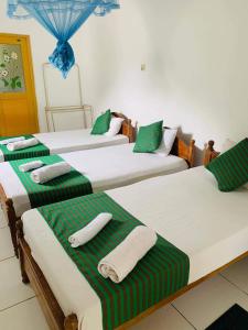 Postel nebo postele na pokoji v ubytování Sunflower Inn