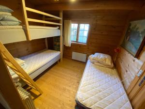 an overhead view of a bedroom with bunk beds at Log-House Wildernest in Brande