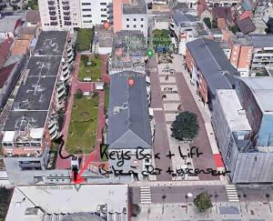 an aerial view of a city with graffiti on it at T2 5 Lys - centre ville, parking privé in Saint-Louis