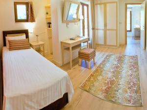 Posteľ alebo postele v izbe v ubytovaní Arktos Hotel