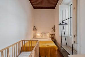 En eller flere senge i et værelse på Chalet Machado