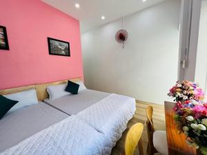 Postel nebo postele na pokoji v ubytování Homestay Little Quy Nhơn + 18 fotografií