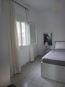 Postel nebo postele na pokoji v ubytování Ακροδεα