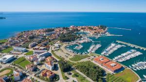 an aerial view of a harbor with boats in the water at Apartments Smilys in Novigrad Istria