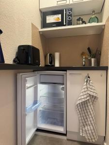 Nhà bếp/bếp nhỏ tại Süßes Apartment im Centrum direkt am Aasee