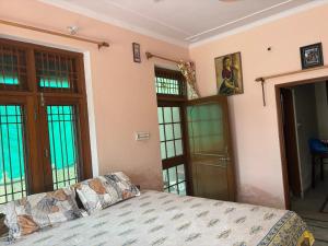 Ένα ή περισσότερα κρεβάτια σε δωμάτιο στο Vishal Villa +67 φωτογραφίες