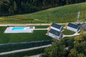 an aerial view of a house in a vineyard at Wine Resort Mak in Maribor +40 photos