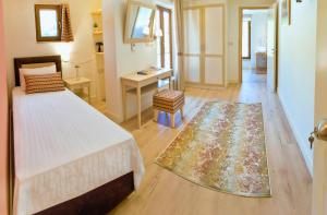 Posteľ alebo postele v izbe v ubytovaní Arktos Hotel