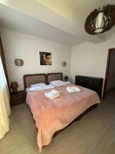 Postel nebo postele na pokoji v ubytování Verona Apartment