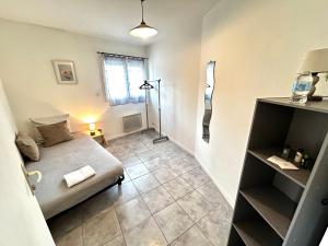Un ou plusieurs lits dans un hébergement de l'établissement Ô'Berge & Chambres Avignon