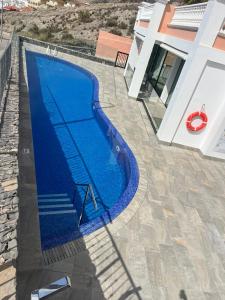The swimming pool at or close to Amazing Duplex with panoramic ocean views