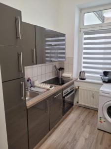 Η κουζίνα ή μικρή κουζίνα στο Werder Appartements Rostock