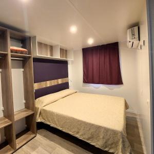 Postel nebo postele na pokoji v ubytování Agriturismo Pituello