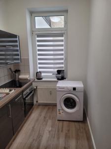 Η κουζίνα ή μικρή κουζίνα στο Werder Appartements Rostock