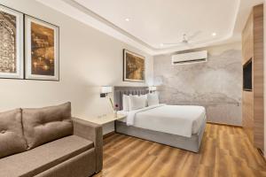 Voodi või voodid majutusasutuse Country Inn Ayodhya - opposite airport toas +15 fotot