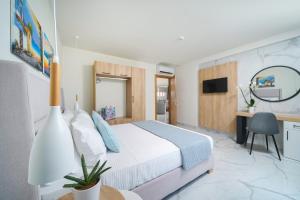Posteľ alebo postele v izbe v ubytovaní Hotel ASTERA