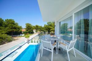 Bazén v ubytovaní Hotel ASTERA alebo v jeho blízkosti