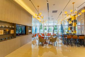 صورة لـ Echarm Hotel Qujing High-speed Railway Station Five Pavilions and One Center Branch في Qujing