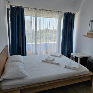 Postel nebo postele na pokoji v ubytování Vila Ayra