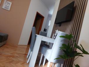 Televisyen dan/atau pusat hiburan di Apartman Sweet Dreams